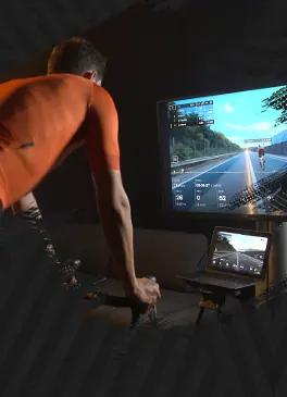 Cyclist practicing virtual indoor cycling